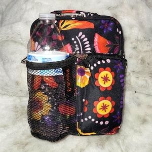 Black with flowers crossbody bag. Canvas holds bottle water.